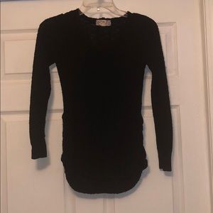 Black woven sweater, tight